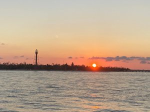 a sunset over a body of water