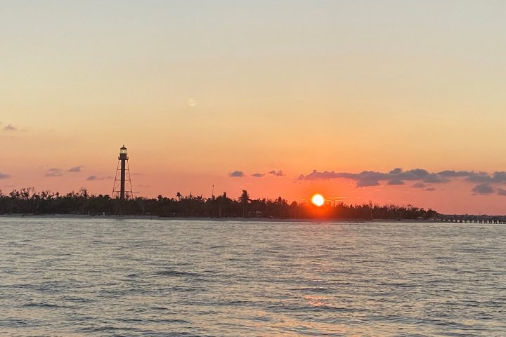 a sunset over a body of water