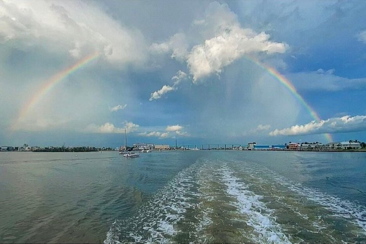 a rainbow over a body of water